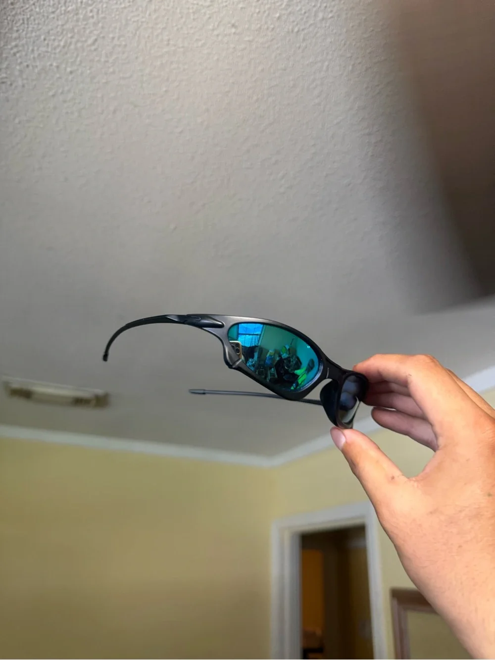 Black Sports Sunglasses with Blue Mirrored Lenses Oakley